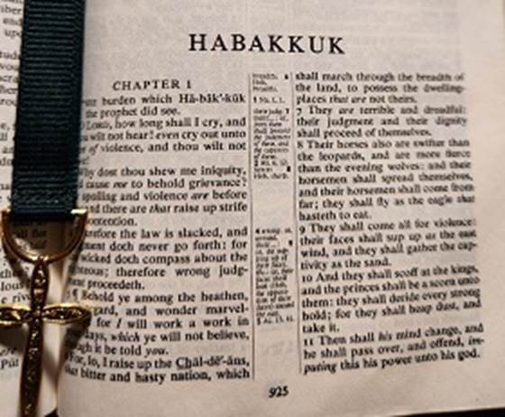 image of a Bible opened to Habakkuk
