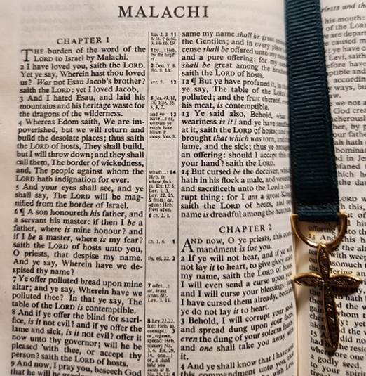 Photo showing the title page to the Book of Malachi in a Bible