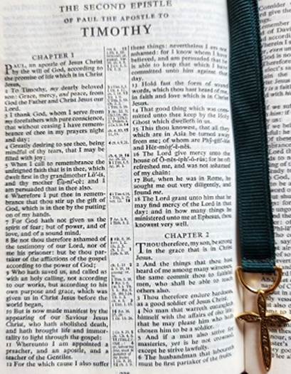 picture of a Bible opened to first page of Second Timothy