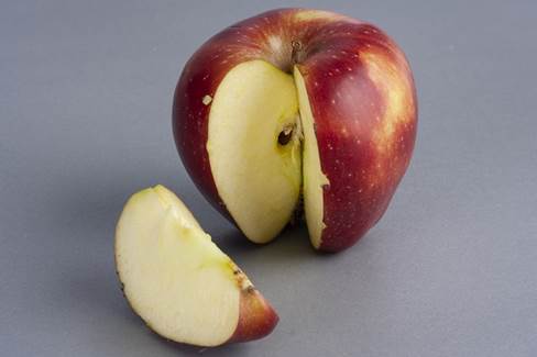 an apple with slice cut out.